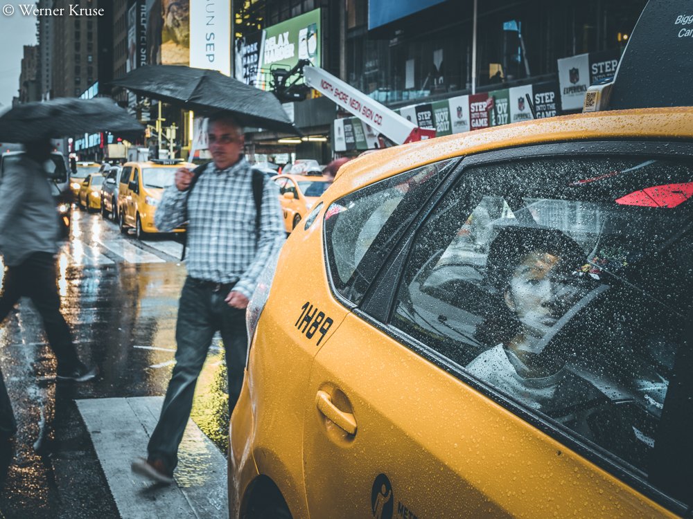 Through the Rain-Streaked Glass