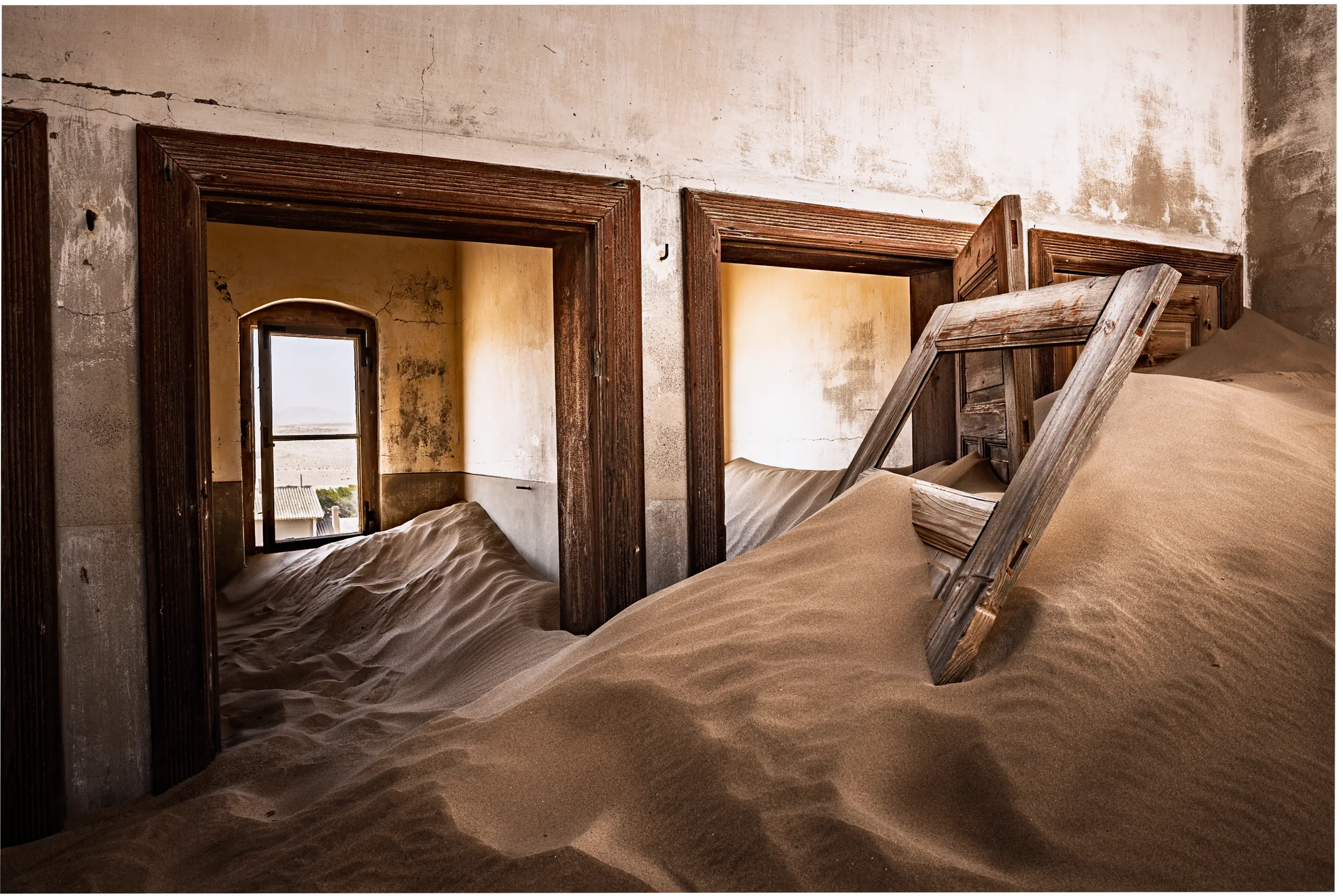 Sand Reclaims the Rooms