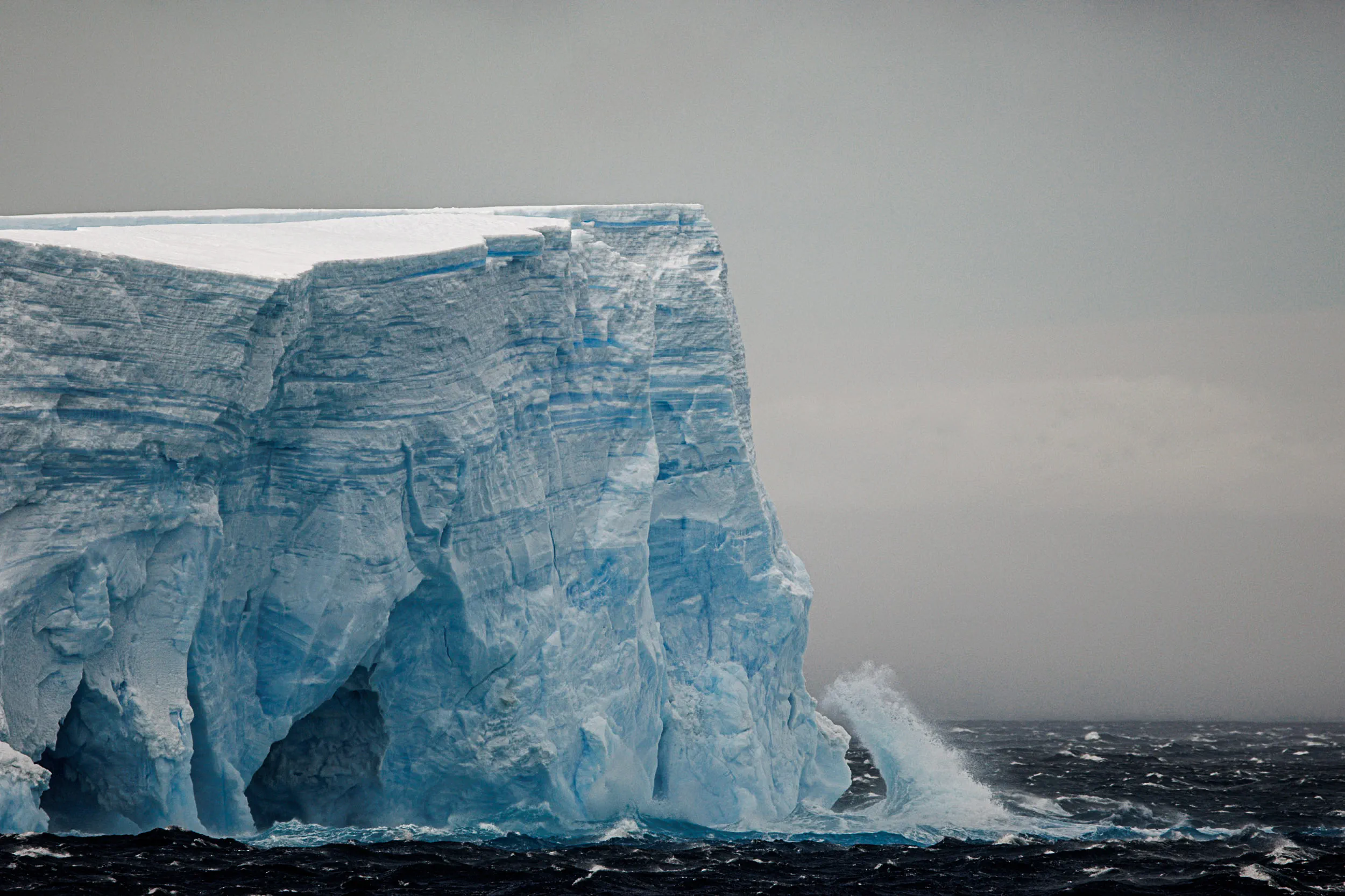 Tabular Iceberg, Breaking Wave · Antarctic Sound, Antarctica