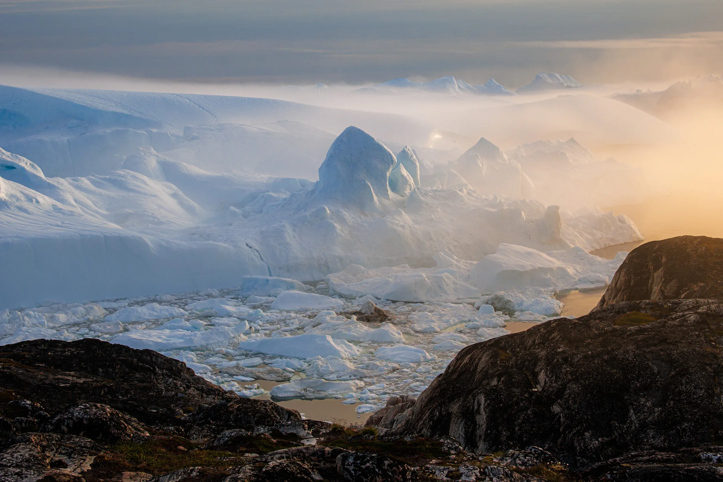 Where Fog Swallows the Fjord · Ilulissat, Greenland