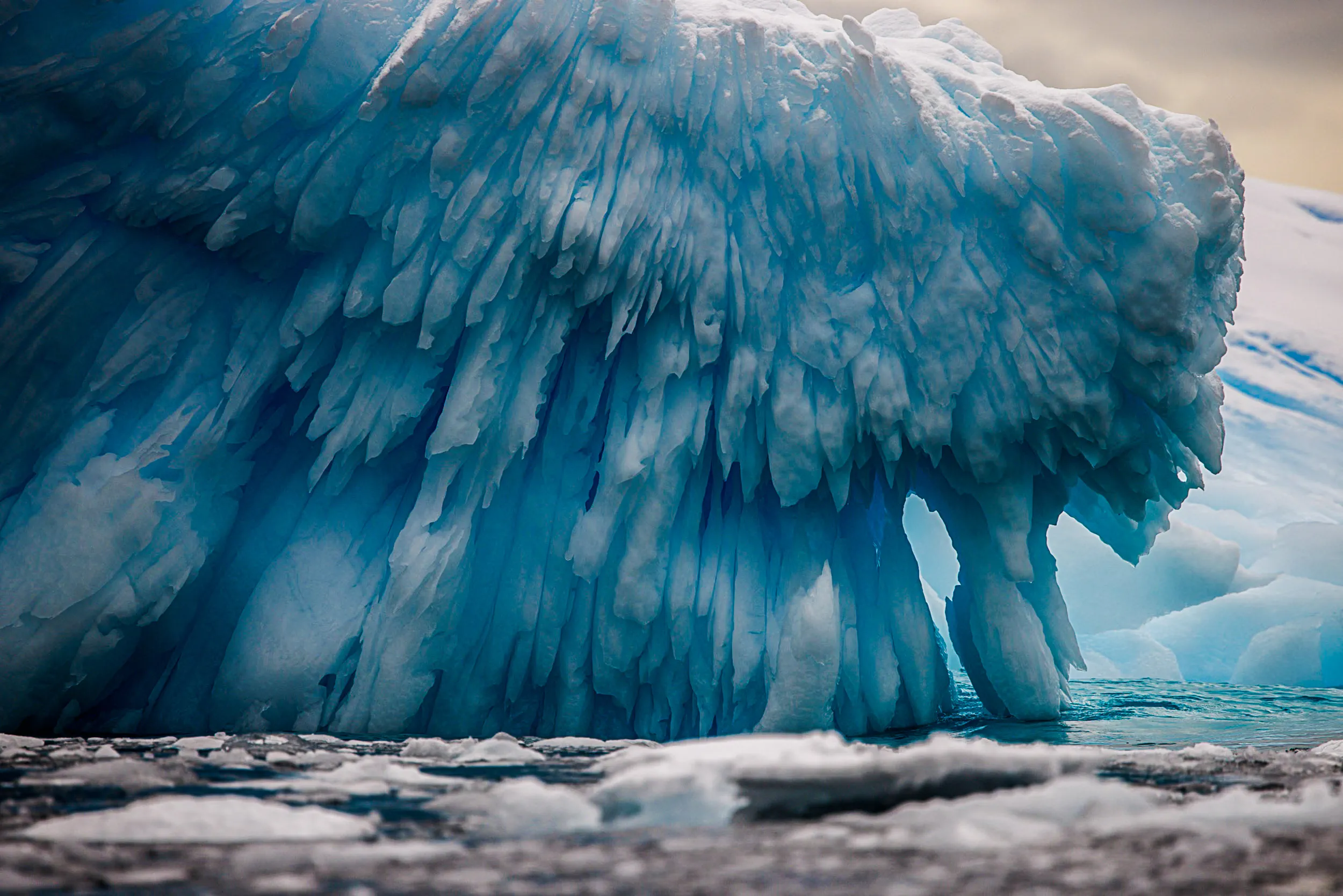 Iceberg Undercut, Fringed Ice · Orne Harbour, Antarctica
